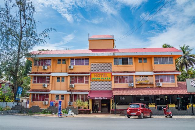Hotel Colva Plaza exterior under blue Goa sky